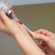 A healthcare professional draws up a dose of the Moderna Covid-19 vaccine at the West Wales General Hospital in Carmarthen, Wales, on April 7, 2021.